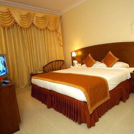 Aj International Hotel Bangalore Ruang foto