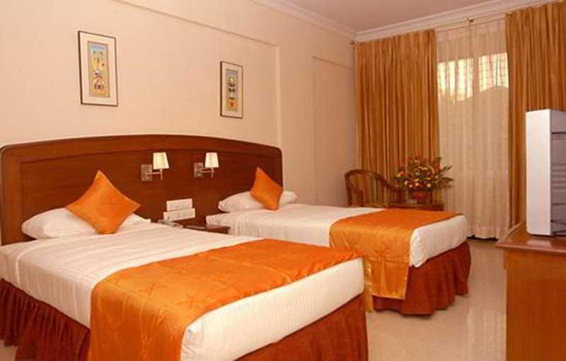 Aj International Hotel Bangalore Bagian luar foto
