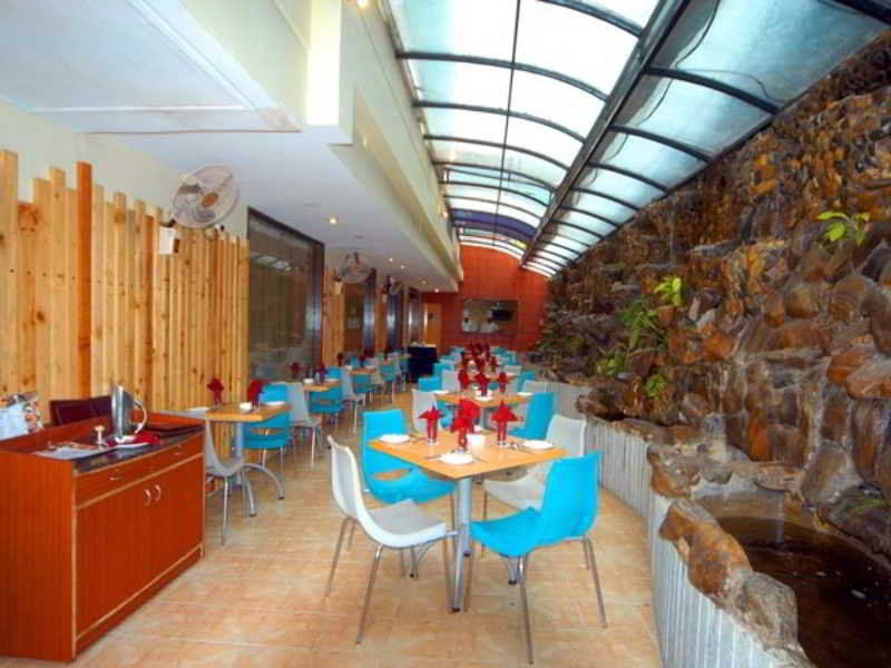 Aj International Hotel Bangalore Restoran foto